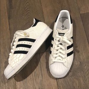 Adidas “snakeskin” superstar sneakers